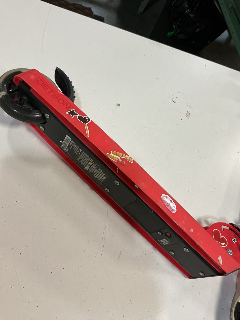 Condition photo showing As Is for jetson jupiter kids 2-wheel light-up kick scooter, led lights on handlebar, stem, wheels & deck, adjustable handlebar, rear brake, easy-folding mechanism, ages 5+ jupiter red