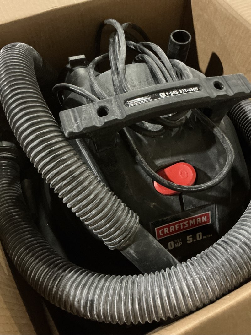 Condition photo showing As Is for craftsman 5-gallon 4-hp corded wet/dry shop vacuum with accessories included