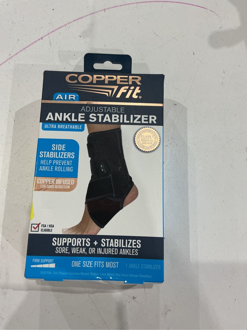 Condition photo showing As Is for copper fit adjustable compression ankle stabilizer for support and pain relief