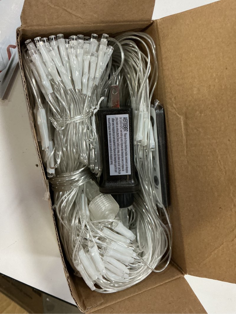 Condition photo showing Good Condition for JMEXSUSS Outdoor Net Lights Waterproof, 12ft x 5ft with 8 Modes Remoter, 360 LED Plug in Net Lights for for Bush Patio Christmas Tree Decor (Clear Wire, White) White 360 LED