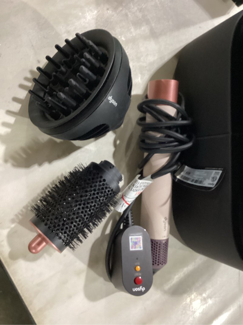 Condition photo showing As Is for Dyson Airwrap i.d.™ Multi-Styler and Dryer