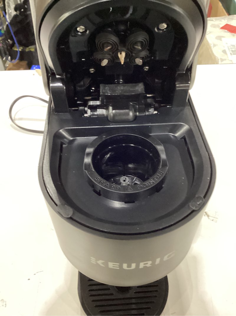 Condition photo showing As Is for keurig k-slim single serve k-cup pod coffee maker, multistream technology, 3 brew sizes, slim and sleek design, 46oz removable reservoir, black