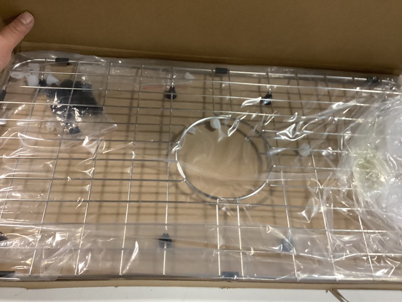 Condition photo showing Good Condition for Serene Valley 25-1/8" x 12-7/8" Sink Grid, Centered Drain with Corner Radius 1-1/2", NLW2513C