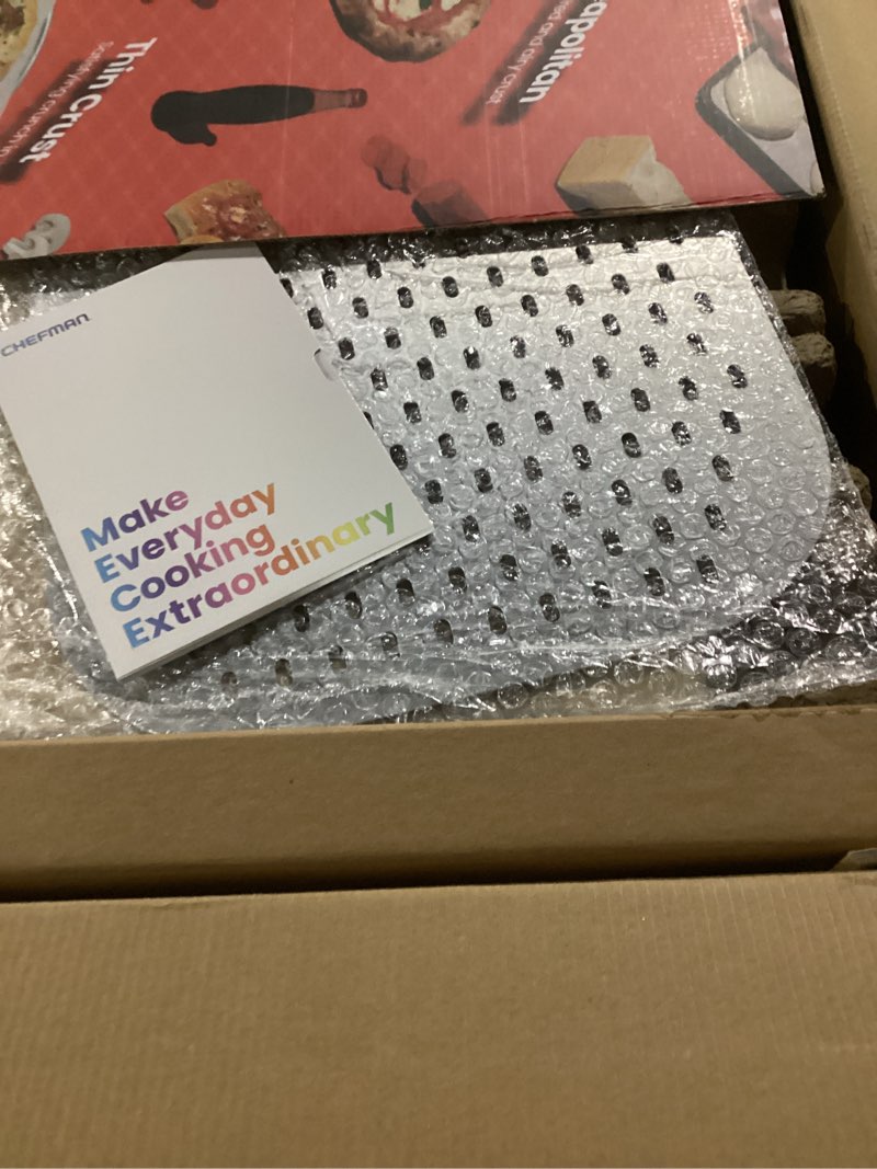 Condition photo showing New/Like New for chefman indoor pizza oven - makes 12 inch pizzas in minutes, heats up to 800°f - countertop electric maker with 5 touchscreen presets, pizza stone and peel included - stainless black 12 inches stainless black