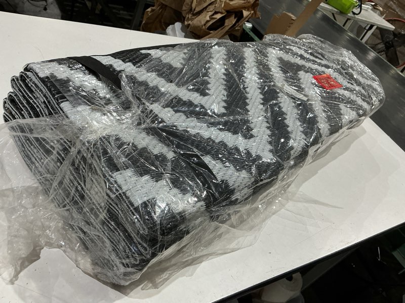 Condition photo showing Good Condition for sand mine waterproof outdoor rug 9x12 ft, plastic reversible rug, modern area rug, large floor mat for outdoors, rv, patio, backyard, deck, picnic, beach, camping (9' x 12', black & white lattice) black & white 9' x 12'