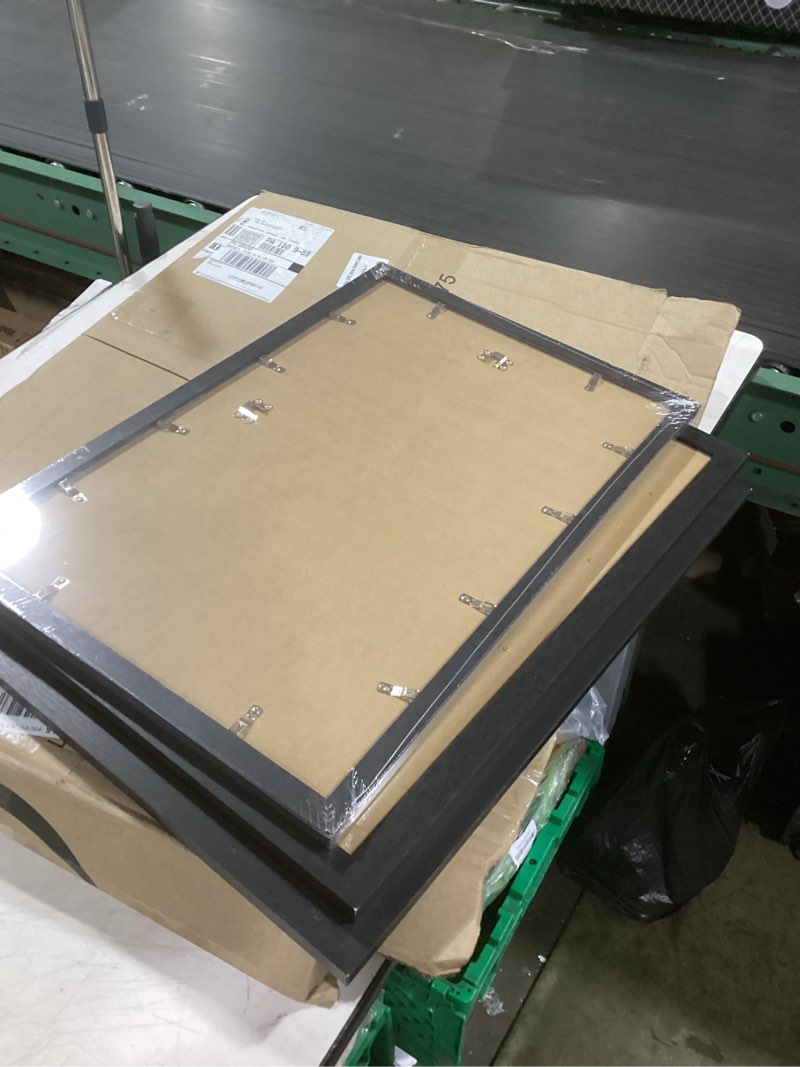 Condition photo showing Good Condition for haus and hues 18x24 black metal picture frames - features premium aluminum, vertical & horizontal hang, shatterproof plexiglass - perfect for home, room, office (18x24 in, black, set of 3)