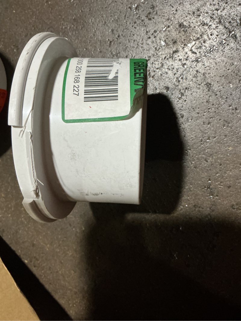 Condition photo showing As Is for fast set 3 in. outside fit or 4 in. inside fit pvc hub toilet flange with test cap and stainless steel ring