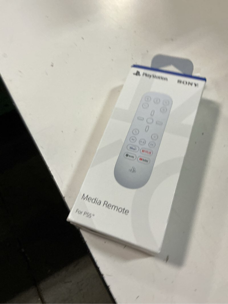 Condition photo showing New/Like New for playstation media remote