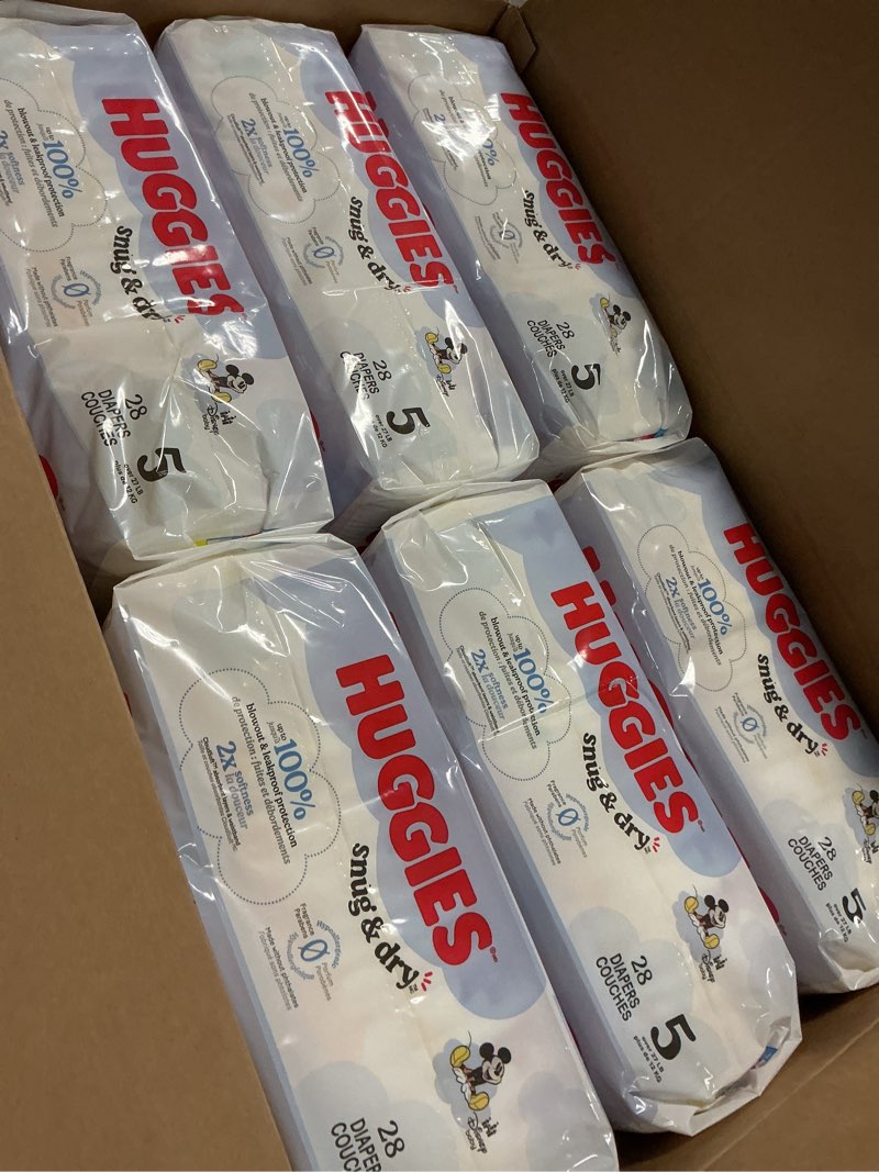 Condition photo showing Good Condition for huggies snug & dry diapers - size 5 - 168ct