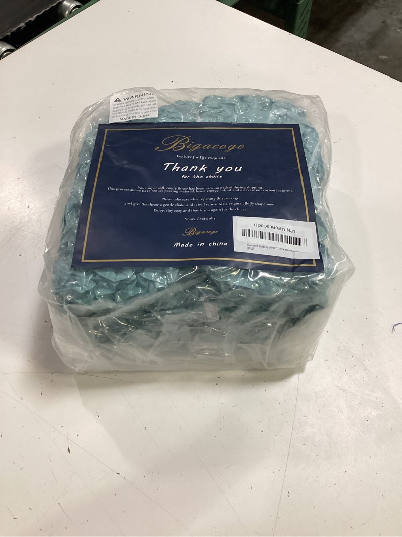 Condition photo showing New/Like New for bigacogo chunky knit throw blanket for couch, 40x60 inches, light teal | hand knit with jumbo chenille, soft breathable cable knit for sofa bed living room, machine washable, gift for mom friend