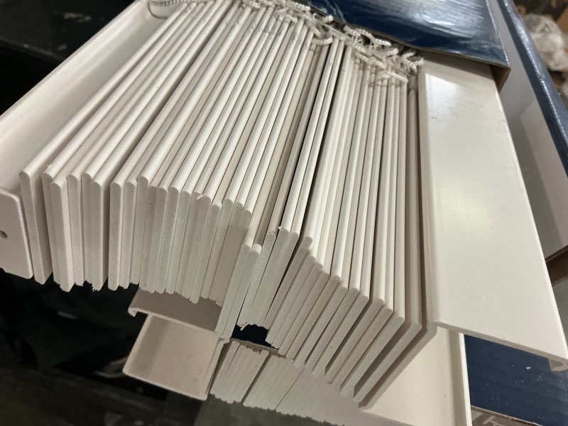Condition photo showing As Is for levolor trim+go 2-in slat width 36-in x 64-in cordless white faux wood room darkening horizontal blinds