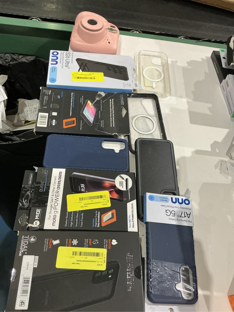Condition photo showing As Is for assorted cellphone/tablet/laptop case covers & accessories