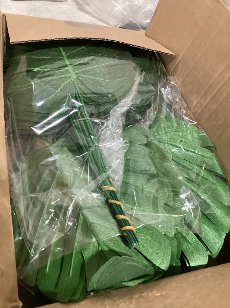 Condition photo showing Good Condition for xonor 100pcs artificial monstera leaves fake tropical faux palm leaves with stem for jungle hawaiian dinosaur luau party table decoration wedding birthday theme party, leaf size: 7''x 5'' 100 11.8