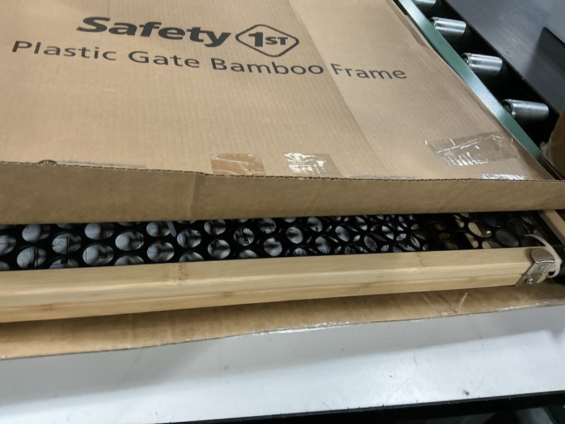 Condition photo showing As Is for safety 1st bamboo baby gate for doorways, no drill easy install, dog gates, fits 28"-42", 24" high, bamboo and black bamboo gate