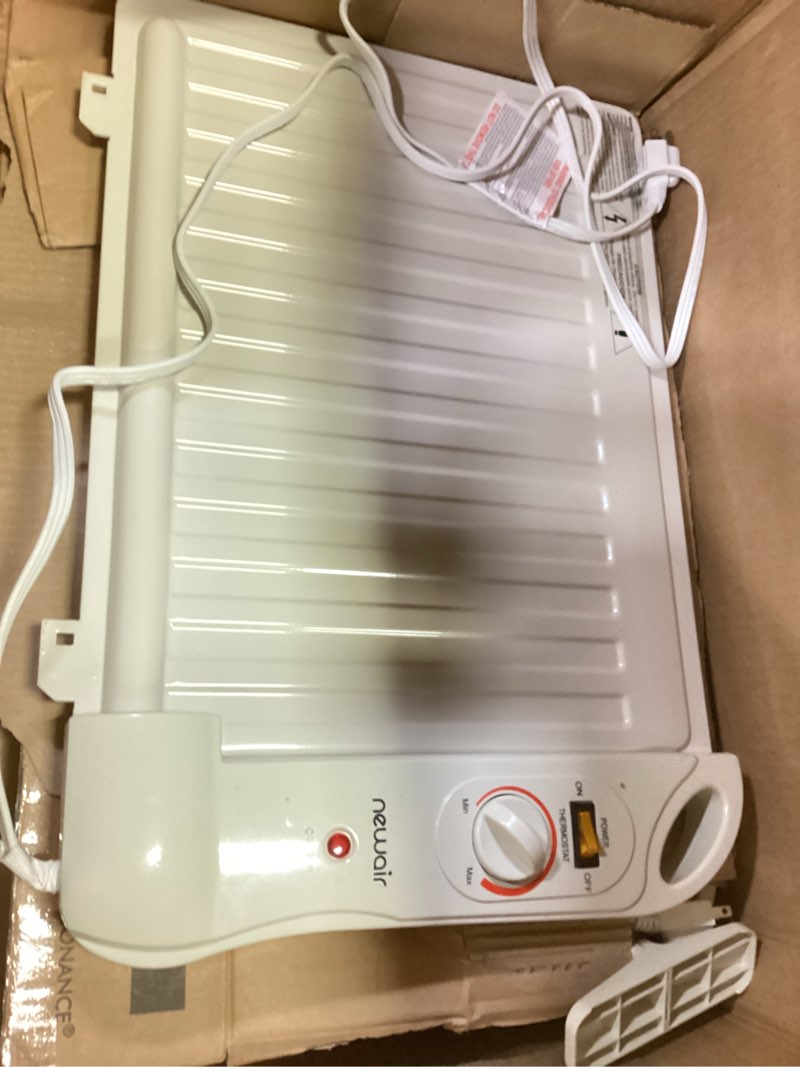 Condition photo showing As Is for NewAir Portable Space Heater for Indoor Use | Ideal Heater for Bedroom, Office or Under Desk | Electric, Energy Efficient and Noiseless 40 ft² White
