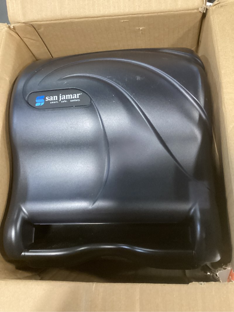 Condition photo showing Good Condition for San Jamar Tear-N-Dry Essence Paper Towel Dispenser Automatic Dispenser for Bathroom, Kitchens, and Restaurants, Plastic, 10 x 14.75 x 12.25 Inches, Black