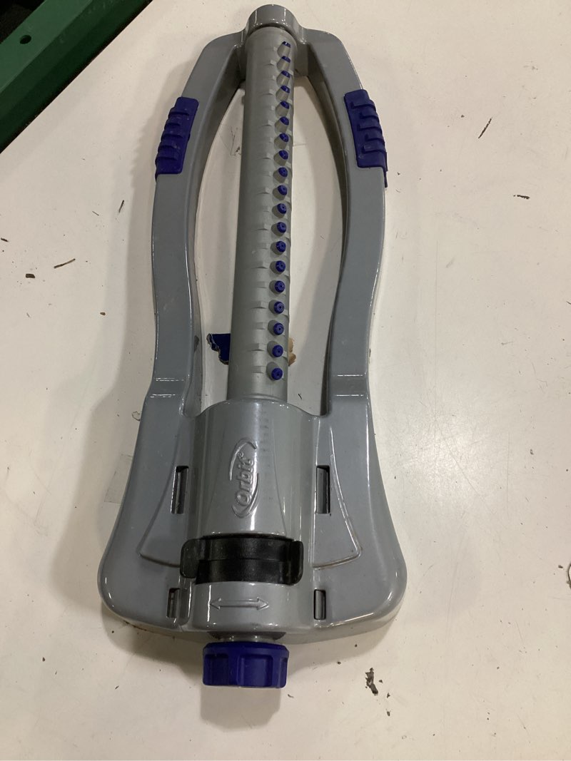 Condition photo showing As Is for orbit orbit max 4000-sq ft oscillating sled lawn sprinkler