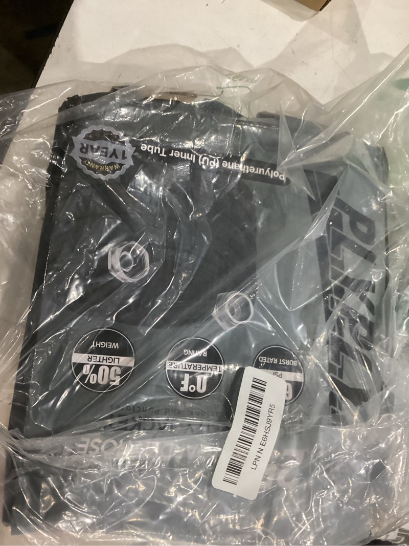 Condition photo showing As Is for garden hose 25ft, made of tpu(not pvc), ultra-light & flexible water hose, non-shrinking, easy to store, drinking water safe material, all-weather, black&gray 25 feet black&gray