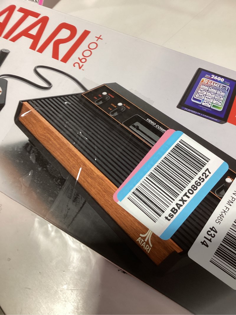 Condition photo showing New/Like New for Official Atari 2600+ Console & Joystick - HDMI Output - Includes 10 Games