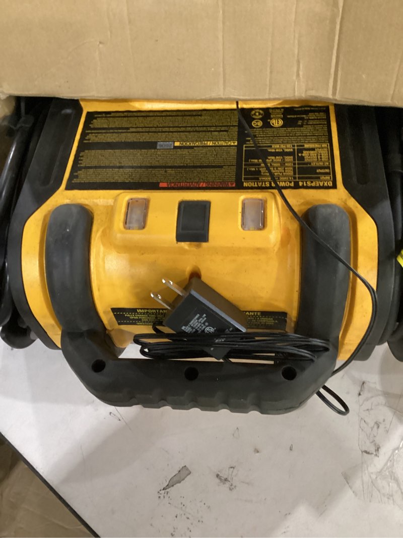 Condition photo showing Good Condition for (not tested)dewalt dxaeps14 2000 peak battery amp 12v automotive battery booster jump starter/power station with 120 psi compressor, 500w ac power inverter, and 15w usba & 25w usb ports