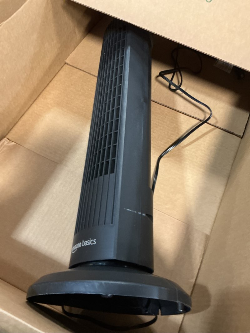 Condition photo showing As Is for amazon basics 28" 60-degree oscillating tower fan for bedroom, living room, office, with 3 speeds, intuitive mechanical control, black, 35w, 27.8"h x 9.4"d x 9.4"w 28" - mechanical control