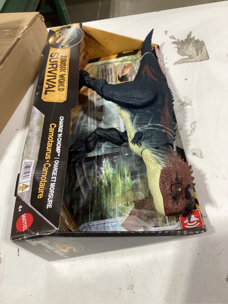 Condition photo showing New/Like New for mattel jurassic world dinosaur action figure, running & biting carnotaurus with roar sounds, charge n chomp, digital play