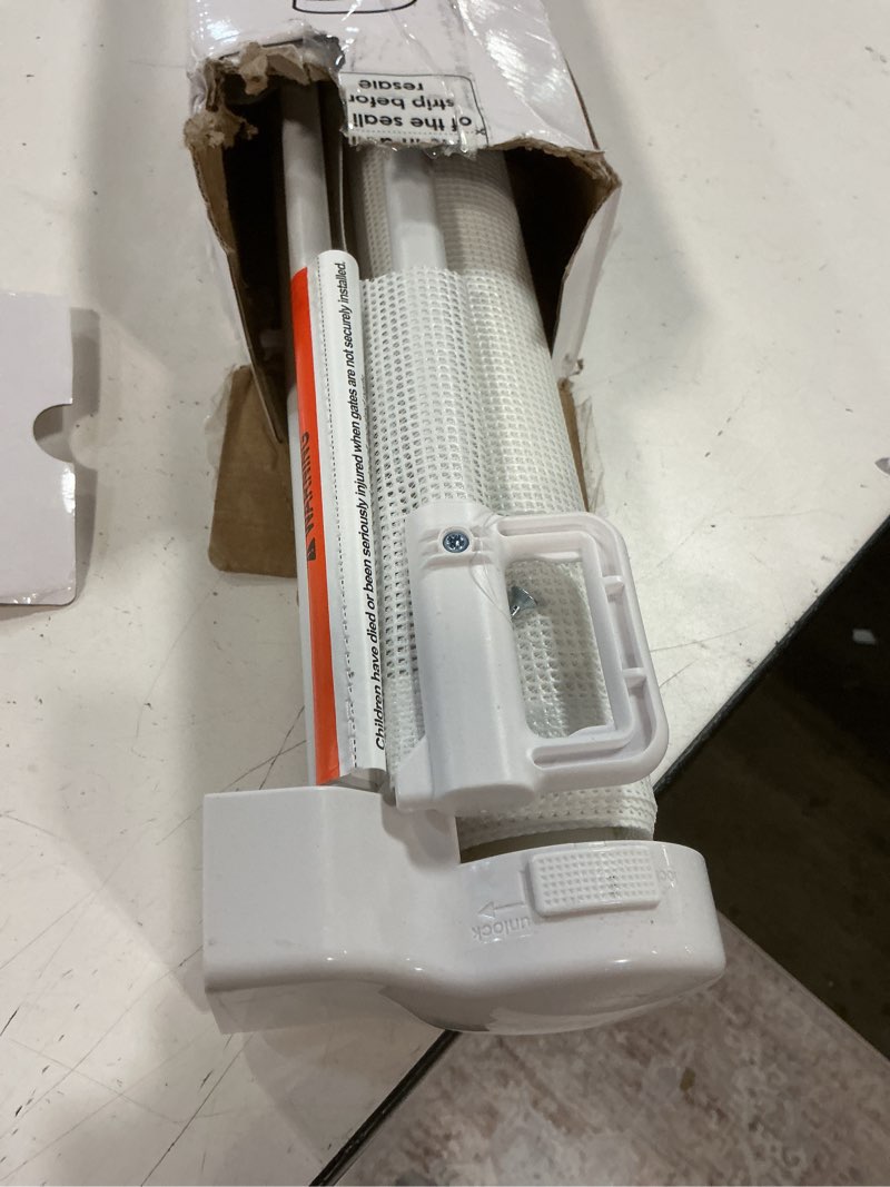 Condition photo showing As Is for reinforced 28 inch tall retractable baby gates for dogs, easy step over pet gate with support rods, 55" wide retractable dog gate, puppy gates for the house short dog gate for stairs, doorways, white