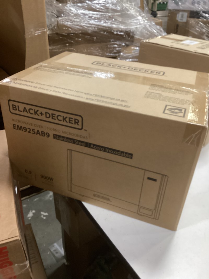 Condition photo showing New/Like New for BLACK+DECKER Digital Microwave Oven with Turntable Push-Button Door, Child Safety Lock, Stainless Steel, 0.9 Cu Ft 0.9 Cu.Ft