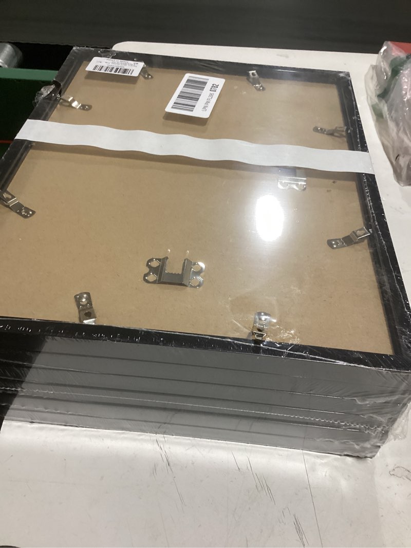 Condition photo showing Good Condition for fxojyvo 10x13 picture frame set of 6, black frame for 10 x 13 inch picture poster photo, light weight and high transparent 10 by 13 frame for wall - 6 pack/black/10 x13 black 10x13 6 packs