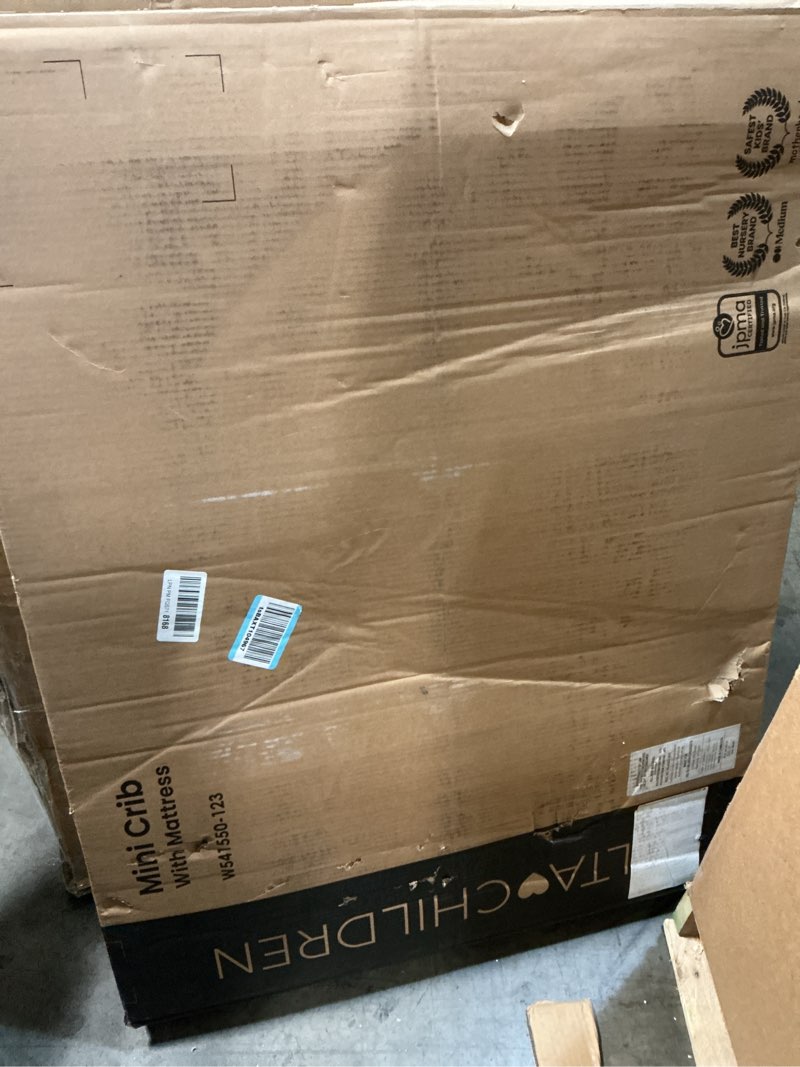 Condition photo showing Good Condition for Delta Children Gio Mini Crib with 2.75" Mattress Included, Bianca White/Natural Bianca White/Natural Modern