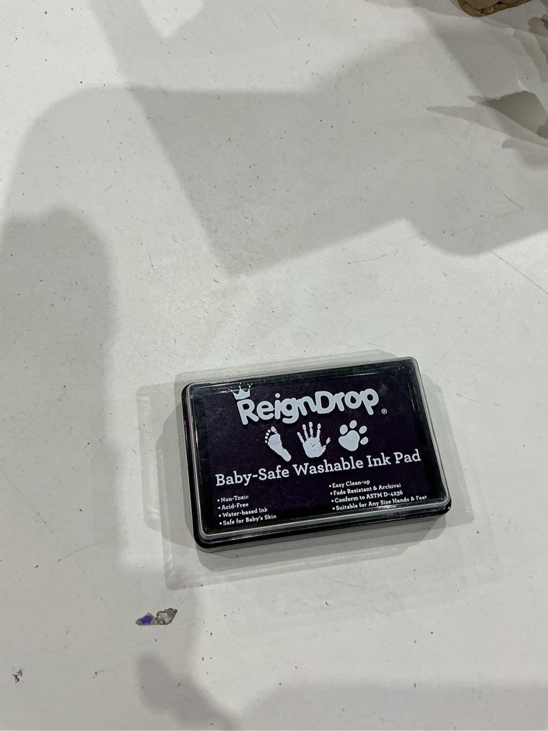 Condition photo showing Good Condition for reigndrop baby ink pad for hand and footprints, non-toxic acid-free keepsake kit, smudge-proof archival ink wipes off skin, for scrapbook, photo album, frames & pet paws, baby gift (purple)