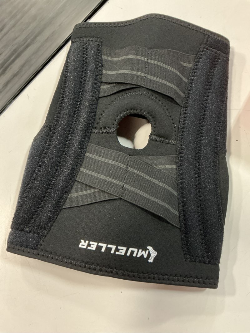 Condition photo showing Good Condition for mueller self adjusting knee stabilizer, black, one size fits most