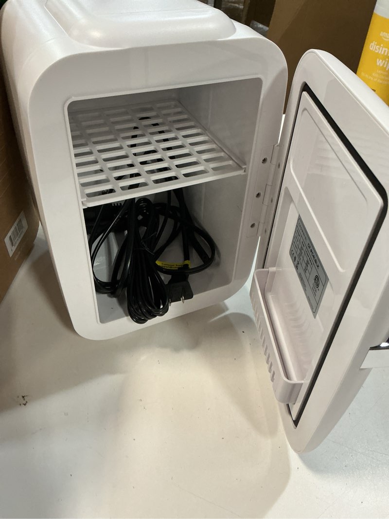 Condition photo showing Good Condition for CROWNFUL Mini Fridge, 4 Liter/6 Can Portable Cooler and Warmer Personal Refrigerator for Skin Care, Cosmetics, Beverage, Food,Great for Bedroom, Office, Car, Dorm, ETL Listed (White)