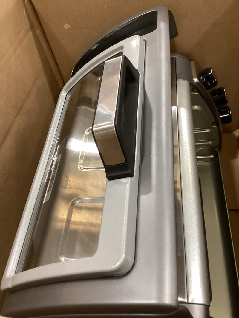 Condition photo showing As Is for Hamilton Beach Air Fryer Toaster Oven Combo with Large Capacity, Fits 6 Slices or 12” Pizza, 4 Cooking Functions for Convection, Bake, Broil, Roll-Top Door, Easy Reach Sure-Crisp, Stainless Steel