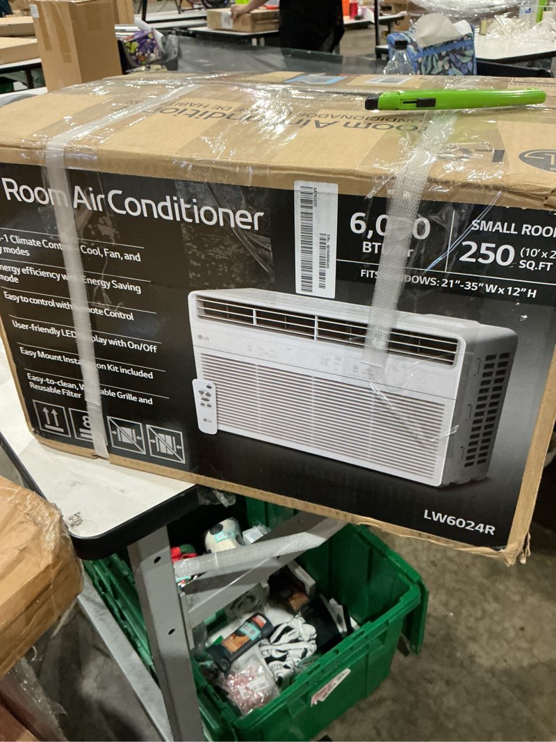 Condition photo showing As Is for lg 6,000 btu window air conditioner, cools 250 sq.ft. (10' x 25' room size), quiet operation, electronic control with remote, 2 cooling & fan speeds, 2-way air deflection, auto restart, 115v