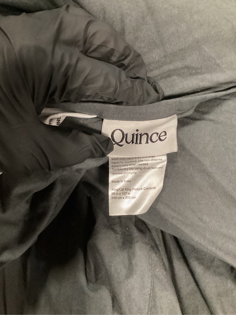 Condition photo showing As Is for cotton pintuck comforter, king/cal king, nightfall