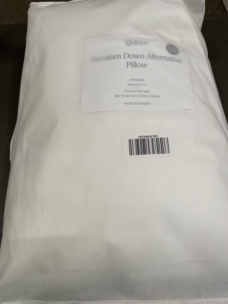 Condition photo showing New/Like New for premium down alternative pillow, standard, medium/firm