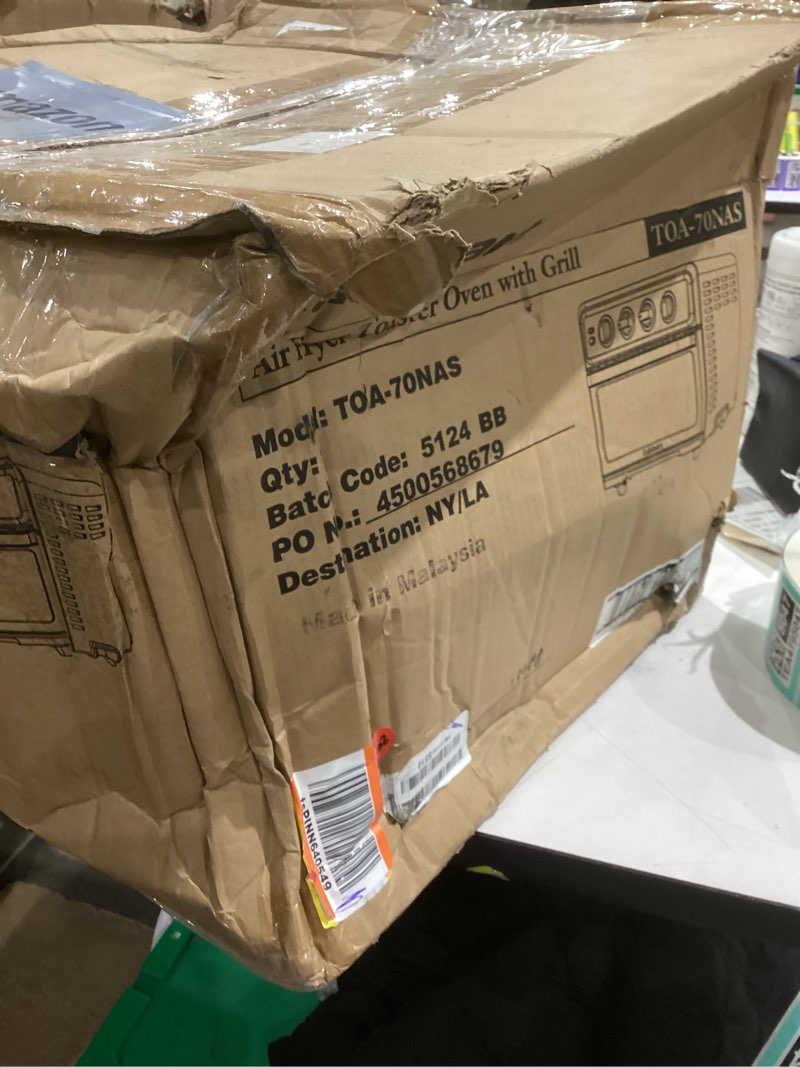 Condition photo showing As Is for Cuisinart Air Fryer Toaster Oven, 1800W, 8-in-1 with Air Fry, Convection, Broil & Warm, 0.6 Cubic Feet, 60-Minute Timer, TOA-70NAS, Stainless Steel Stainless Steel Convection Toaster Air Fryer Oven w/ Grill