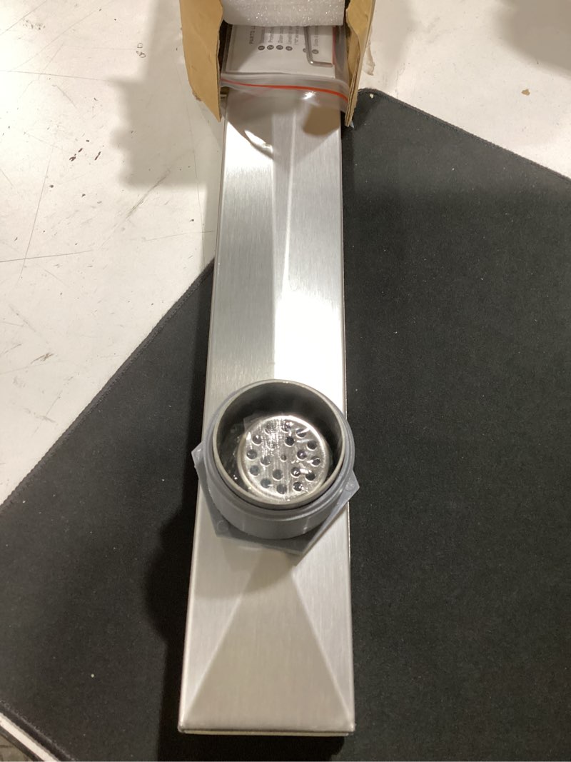 Condition photo showing Good Condition for neodrain 48-inch offset linear shower drain with tile insert grate cover, brushed 304 stainless steel rectangle side outlet shower floor drain, adjustable leveling foot, hair strainer/catcher brushed-tile insert cover 48 in