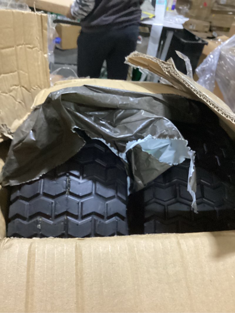 Condition photo showing As Is for 2-pack 16x6.50-8 tubeless tires and wheels, 3/4-inch bearingswith extra 1-inch bushings, 3"-5" offset hub, 550 lbs load capacity, fits 3/4" and 1" axles for riding mowers, lawn tractors, and more. 2pc 16x6.5-8 tubless