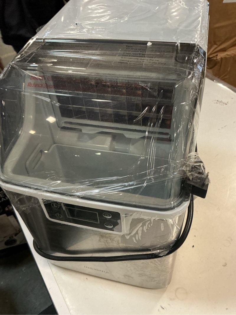 Condition photo showing As Is for INSIGNIA Clear Ice Maker