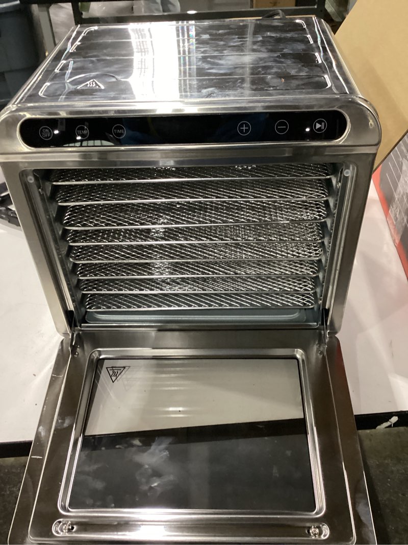 Condition photo showing As Is for NOT TESTED Gourmia 8-Tray Food Dehydrator – Digital Stainless Steel Food Dryer for Jerky, Fruits & Herbs, 95F–185F Temp Control, 30min–48H Timer, Silent Brushless Motor, Even Drying, Includes Recipe Book 8 Tray