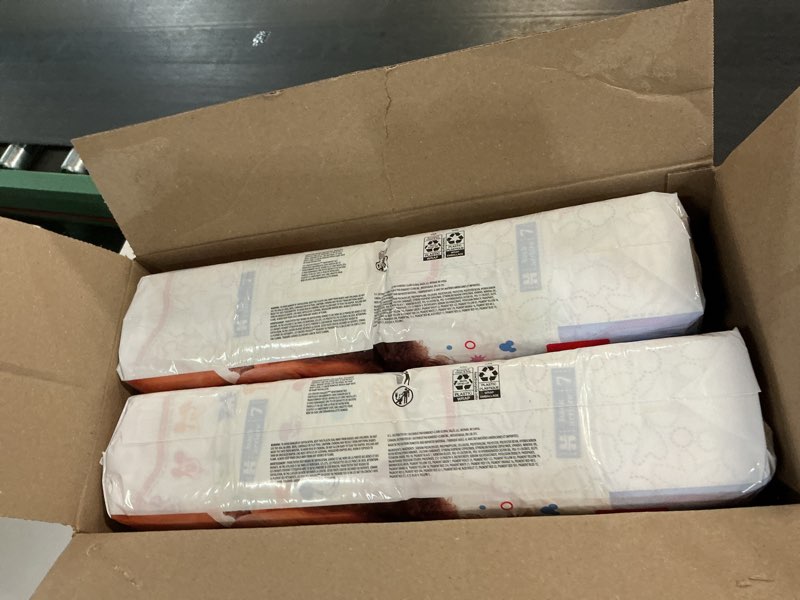 Condition photo showing New/Like New for huggies size 7 diapers, snug & dry baby diapers, size 7 (41+ lbs), 108 count (2 packs of 54), packaging may vary size 7 108