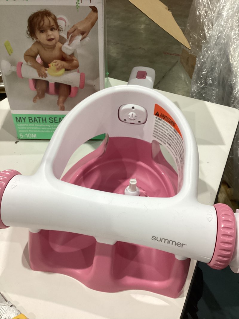 Condition photo showing Good Condition for ingenuity my bath seat for sit-up baby bathing, sure & secure suction cups, astm safety tested & approved, backrest for assisted sitting, easy setup & storage, pink
