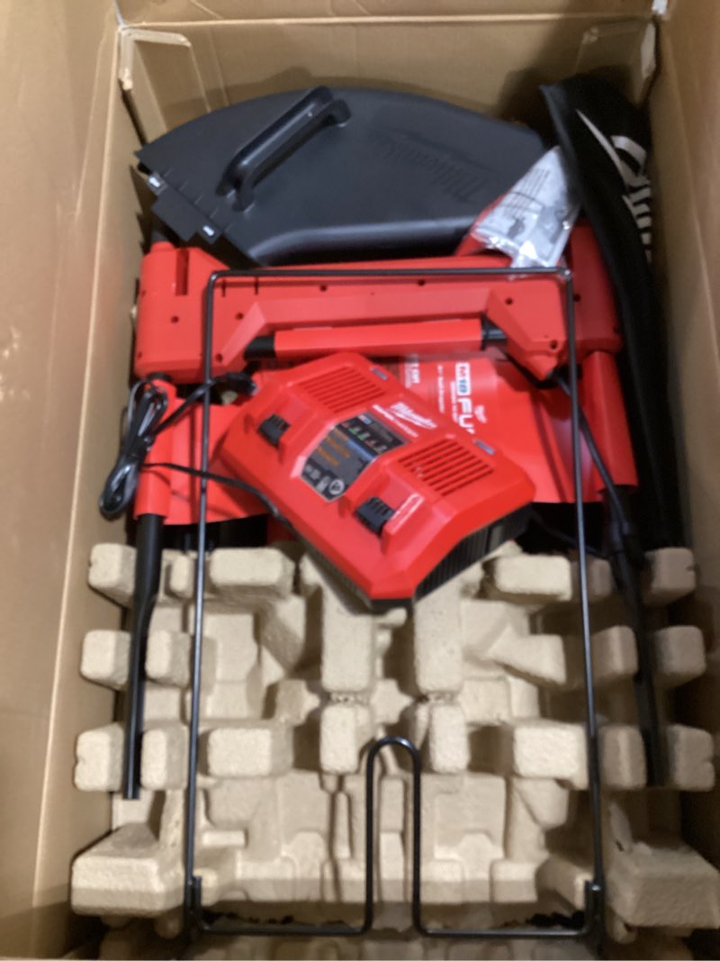 Condition photo showing As Is for milwaukee m18 fuel 2823-22hd 21 in. 18 v battery self-propelled lawn mower kit (battery & charger)