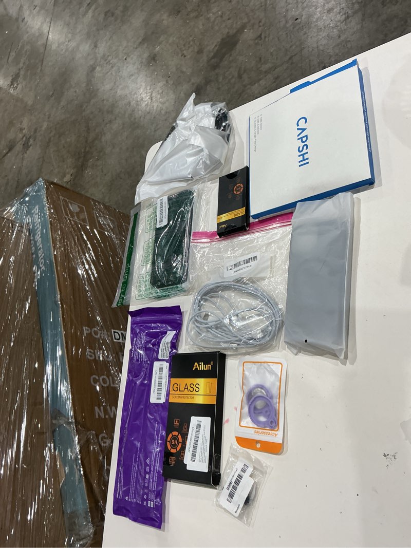 Condition photo showing As Is for assorted cellphone/tablet/laptop case covers & accessories
