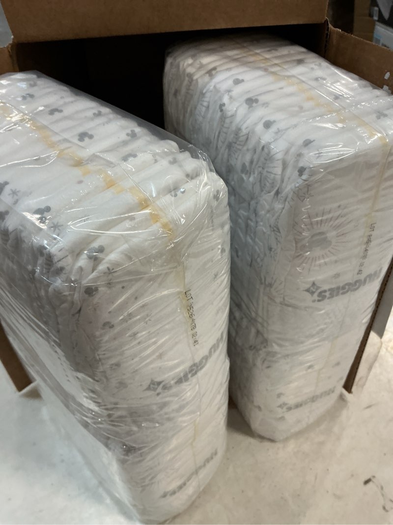 Condition photo showing Good Condition for Huggies Size Newborn Diapers, Skin Essentials Baby Diapers, Size Newborn (6-9 lbs), 76 Count, Packaging May Vary Newborn 76