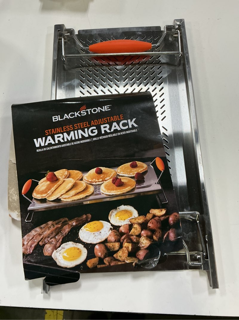 Condition photo showing As Is for blackstone stainless steel adjustable warming rack