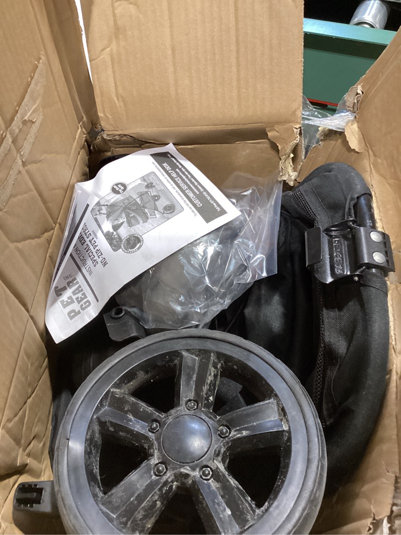 Condition photo showing New/Like New for pet gear no-zip special edition 3 wheel pet stroller for cats/dogs, zipperless entry, easy one-hand fold, removable liner, cup holder, charcoal black