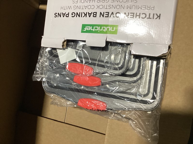 Condition photo showing Good Condition for NutriChef 3-Piece Nonstick Kitchen Oven Baking Pans - Premium & Stylish Non-Stick Steel, Commercial Grade Restaurant Quality Metal Bakeware with Red Silicone Handles - Easy to Clean, NCSBS3S